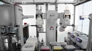 Motoman dual arm robot in biomedical cell [upl. by Ryter]