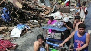 Typhoon Haiyan leaves Tacloban in ruins [upl. by Adnilec]