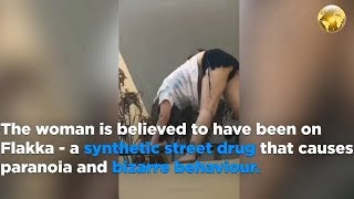 Woman on flakka attempts yoga on balcony ledge  03232018 [upl. by Gass]