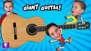 GIANT Guitar at a Museum with HobbyKidsTV [upl. by Rovelli]