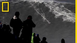 Watch Surfer Ride RecordBreaking Wave  National Geographic [upl. by Silliw50]