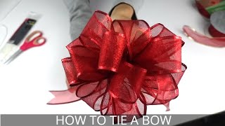 How to Make a Christmas Bow  Easiest BowMaking Method [upl. by Ayatnohs802]